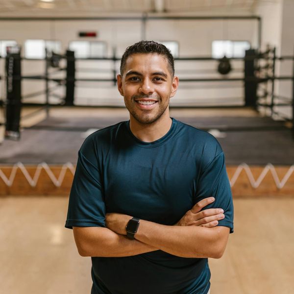 A man looking confident and energetic after a workout session.